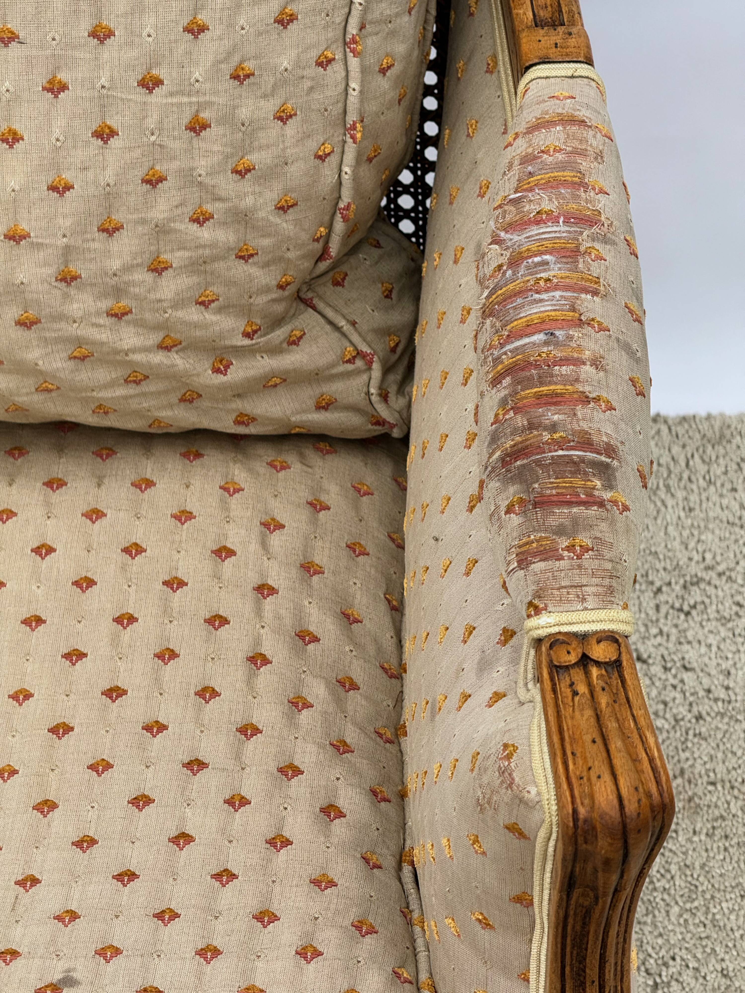 Fauteuil bergère à dossier canné