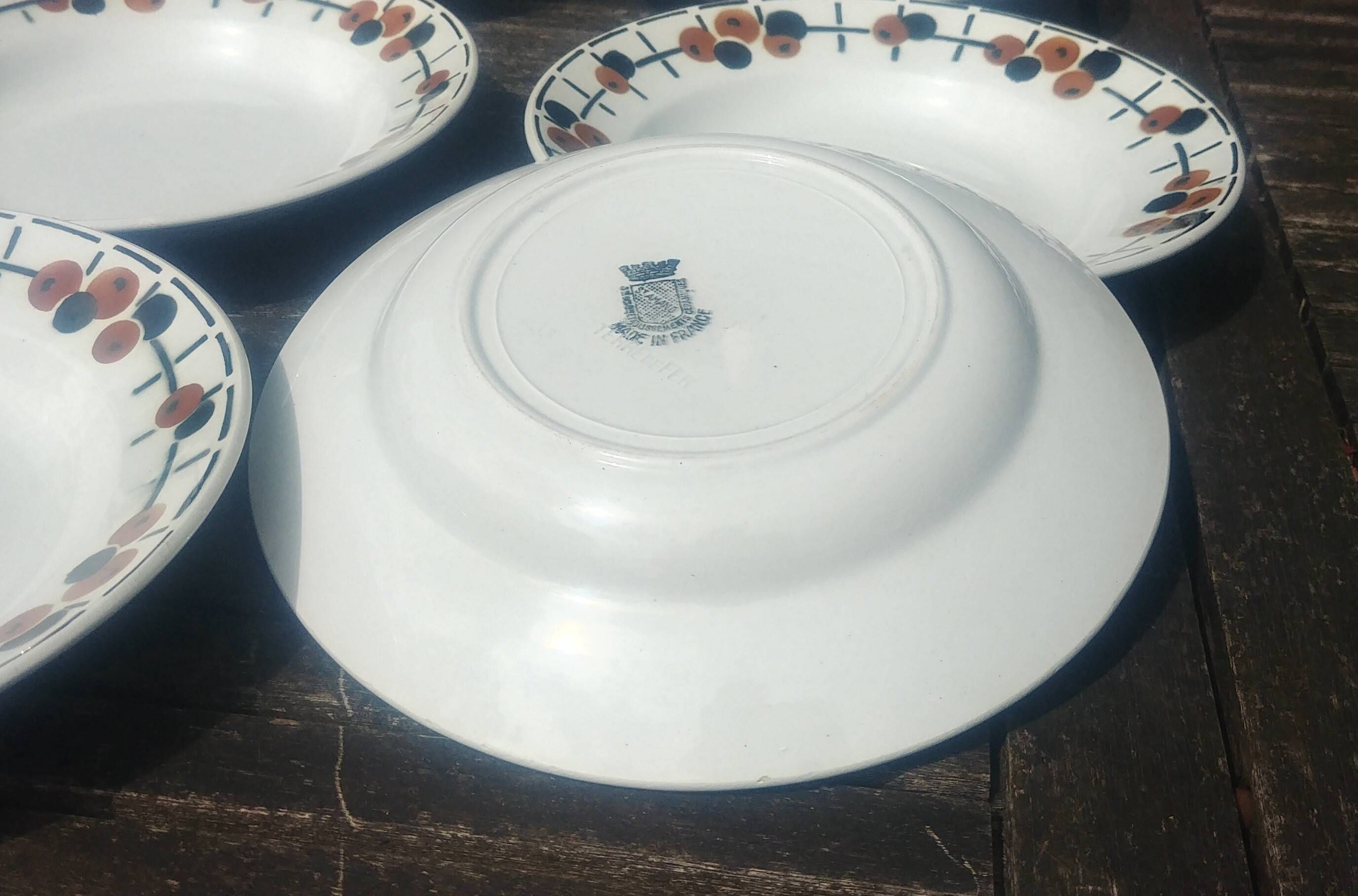 Set of eight ironstone soup plates from the Saint Amand earthenware factory