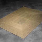 Brown flat-woven jute Indian rug, 1970.