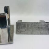 Pair of aluminum design candlesticks