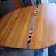 Round extendable teak dining table from the 60s