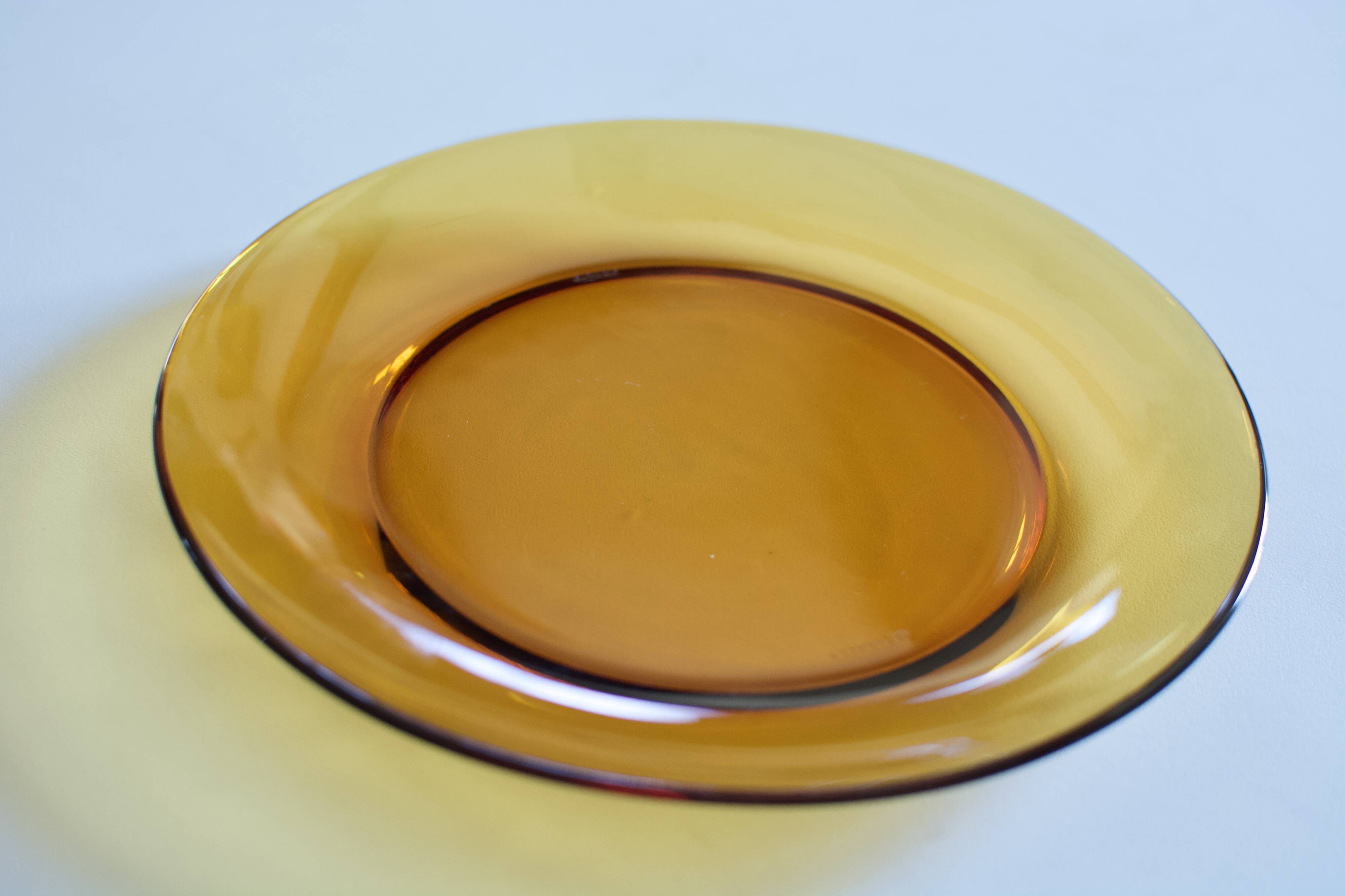 Set of 9 vintage plates in amber glass France