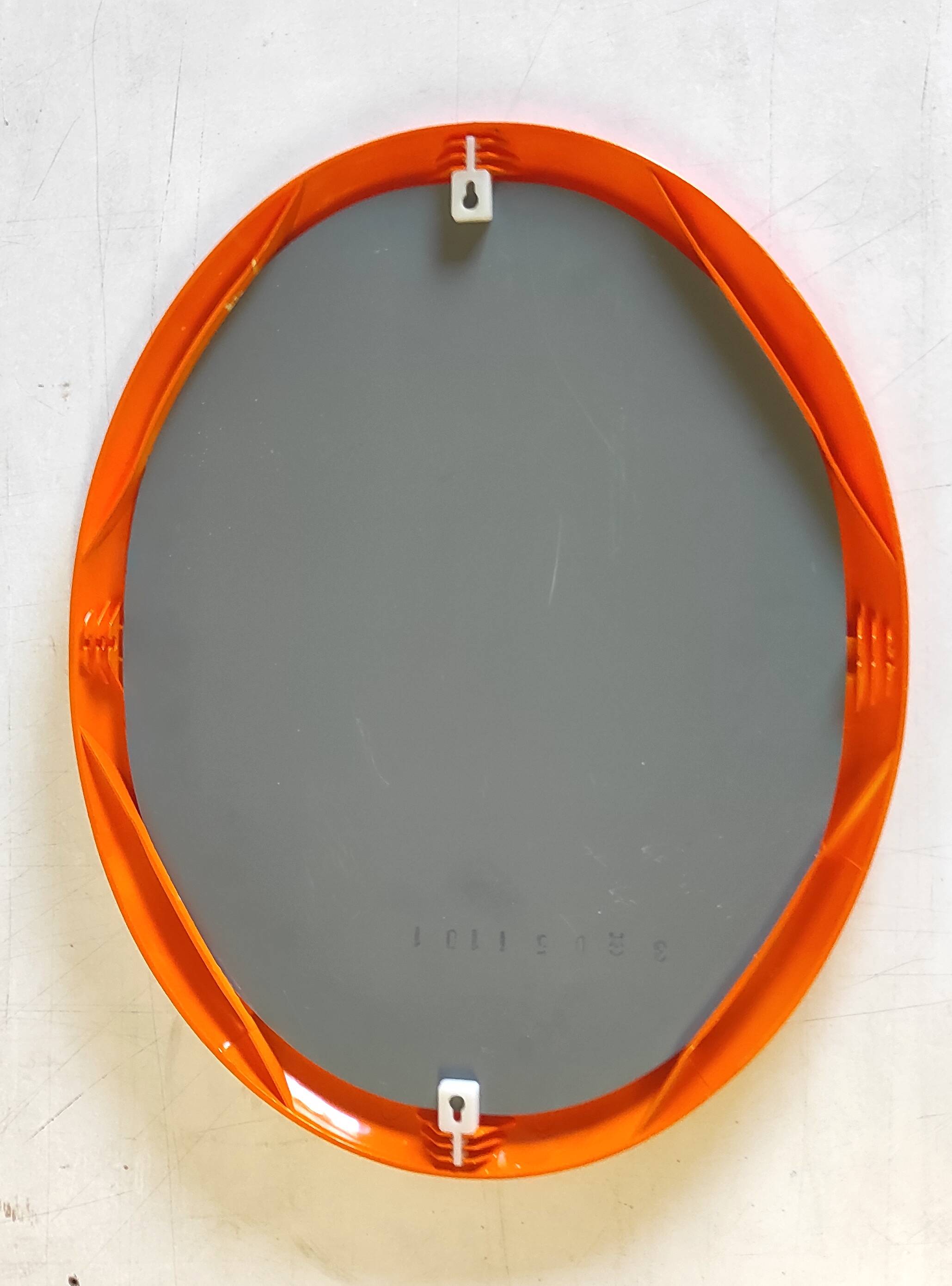 Orange oval mirror - 1970s