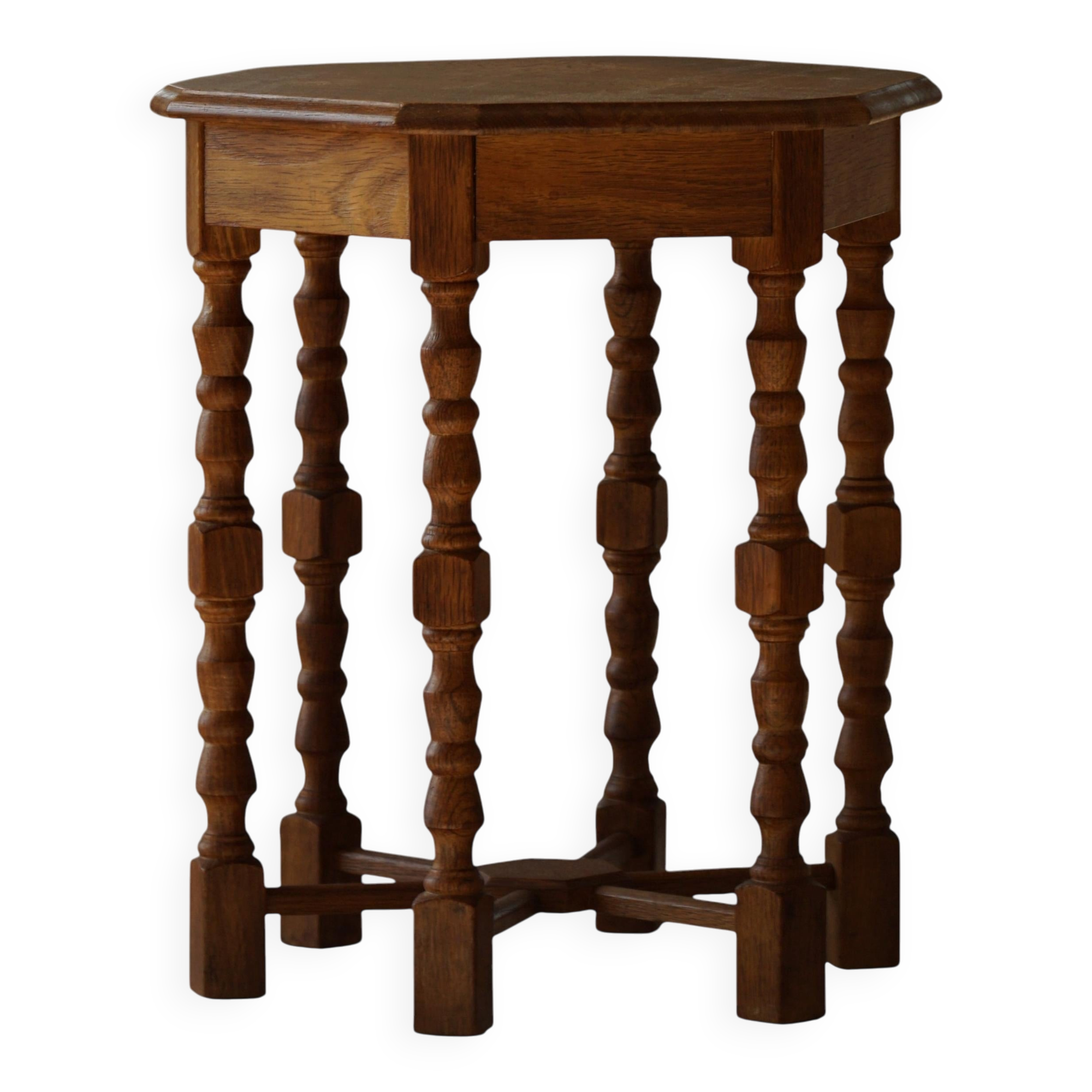 Danish hexagonal side table in oak with turned legs, 1950s.