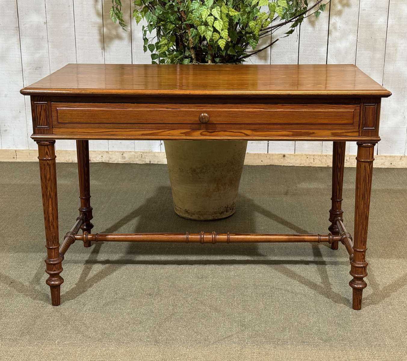Desk table from the early 20th century in pitch pine.