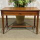 Desk table from the early 20th century in pitch pine.