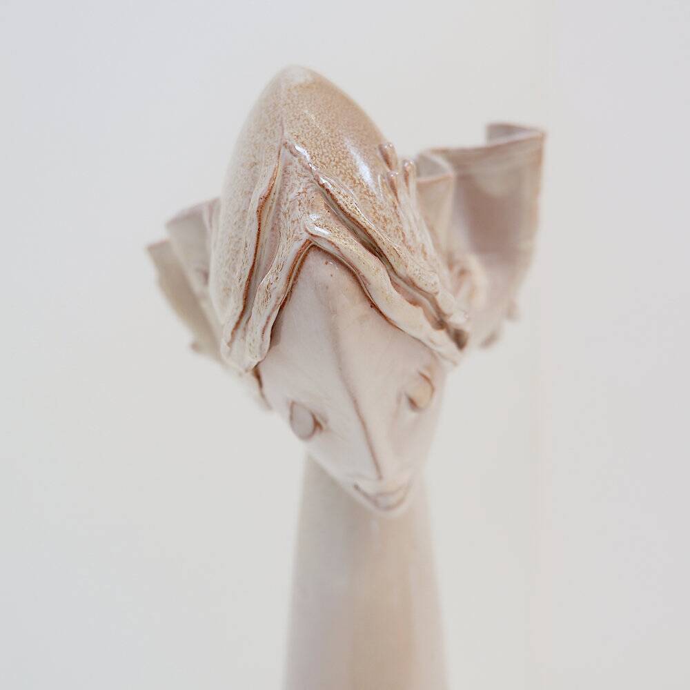 Ceramic sculpture of a female face - flower vase decoration