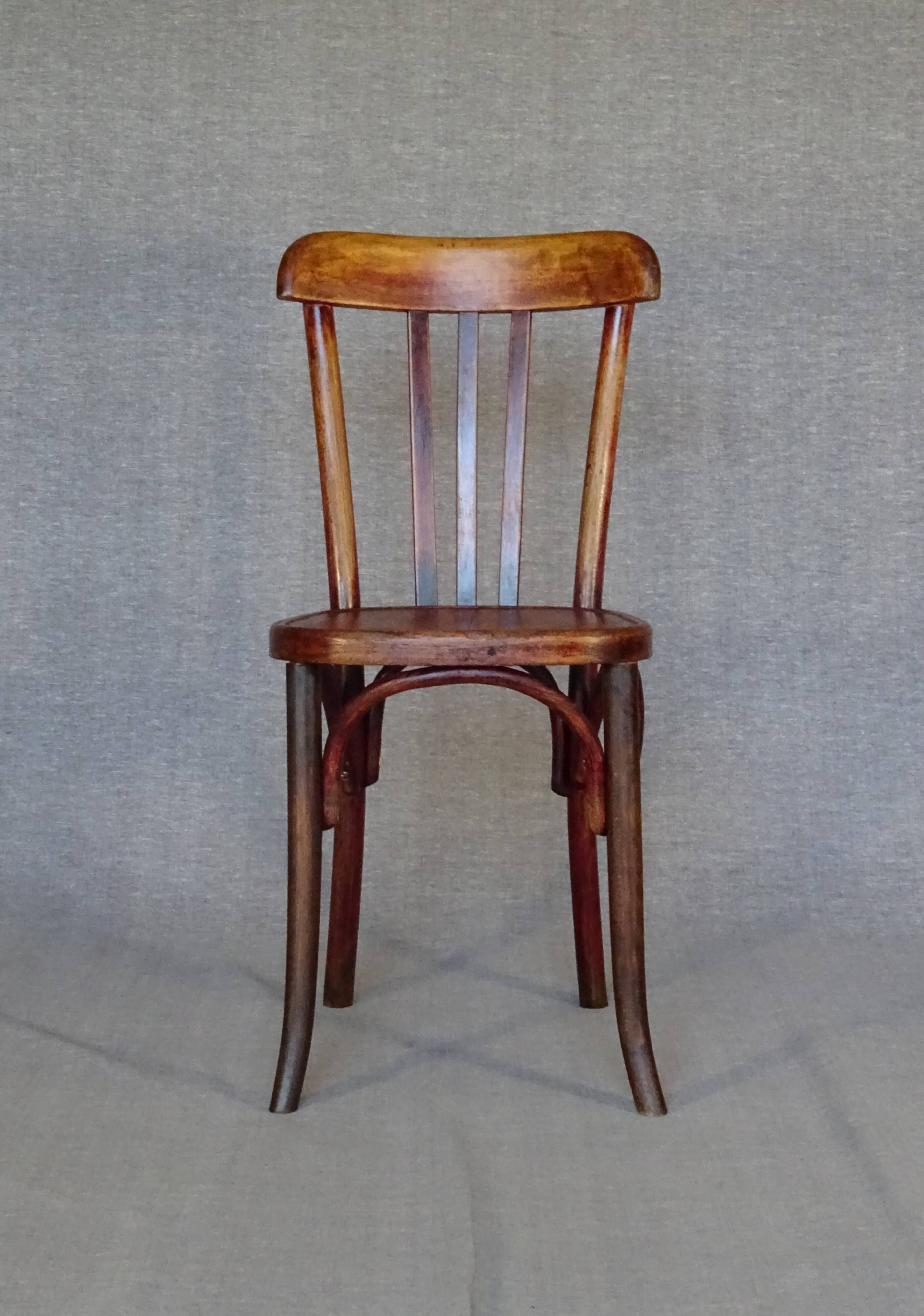 Set of 4 mismatched bistro chairs, 1900 to 1930 with wooden seats, Thonet, Baumann