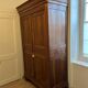 Antique wardrobe from the late 19th century in solid wood.