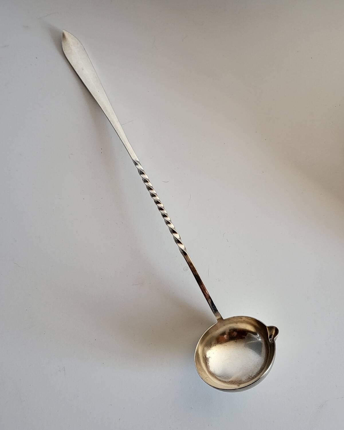 Punch ladle, cocktail, in silver-plated cherry metal.
