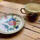 Large cup and saucer in the quimper earthenware style.