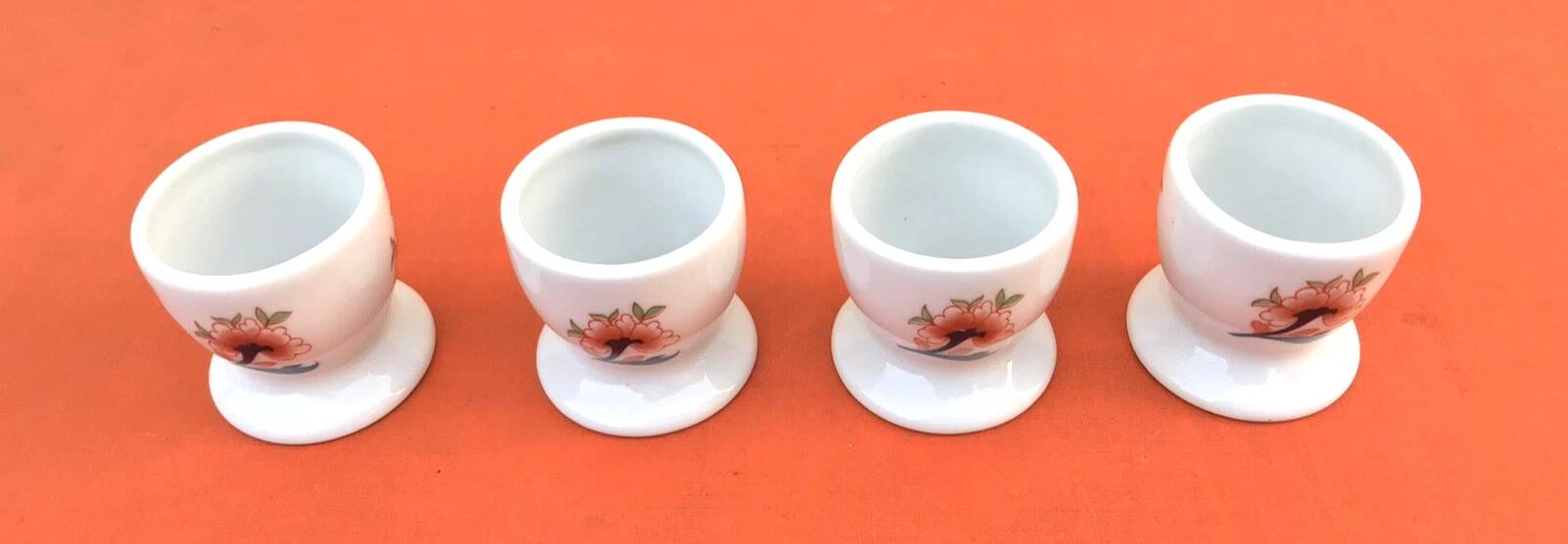 Ulysse Paris porcelain egg cup for Chanill with floral decoration.