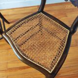 Pair of chairs from the early 20th century, Napoleon III style, with caned seats.