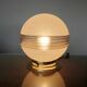 Plafonnier "globe" en verre granité rose,  liserés dorés, vers 1950 ou 1960