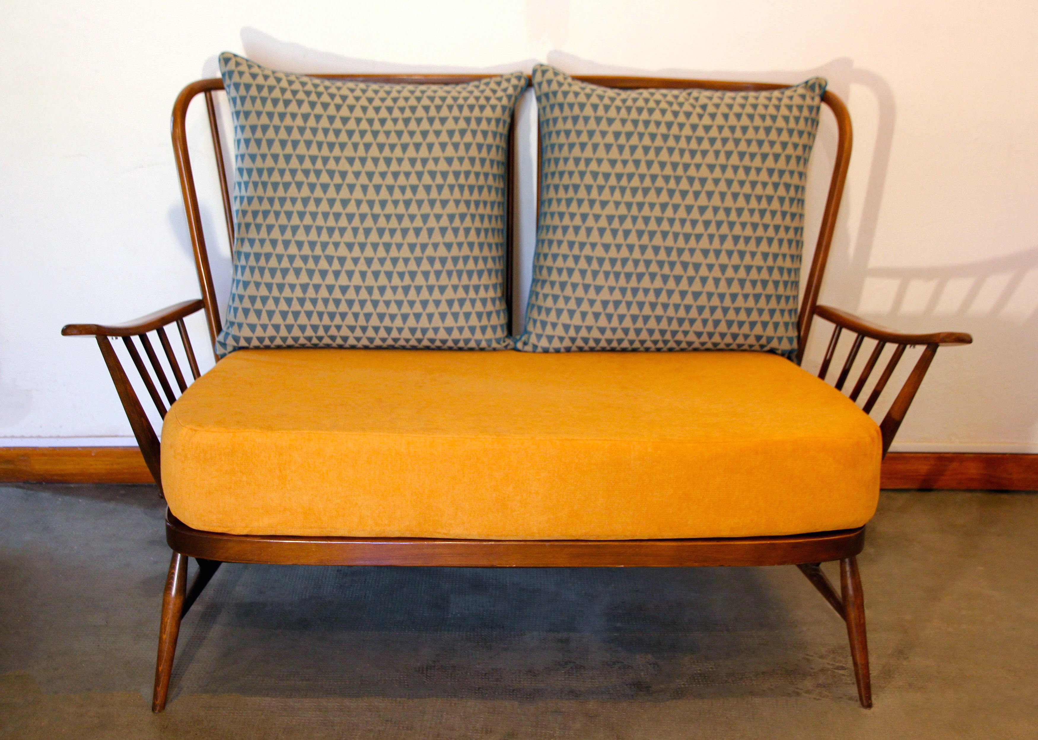 Ercol Springtime mustard yellow sofa