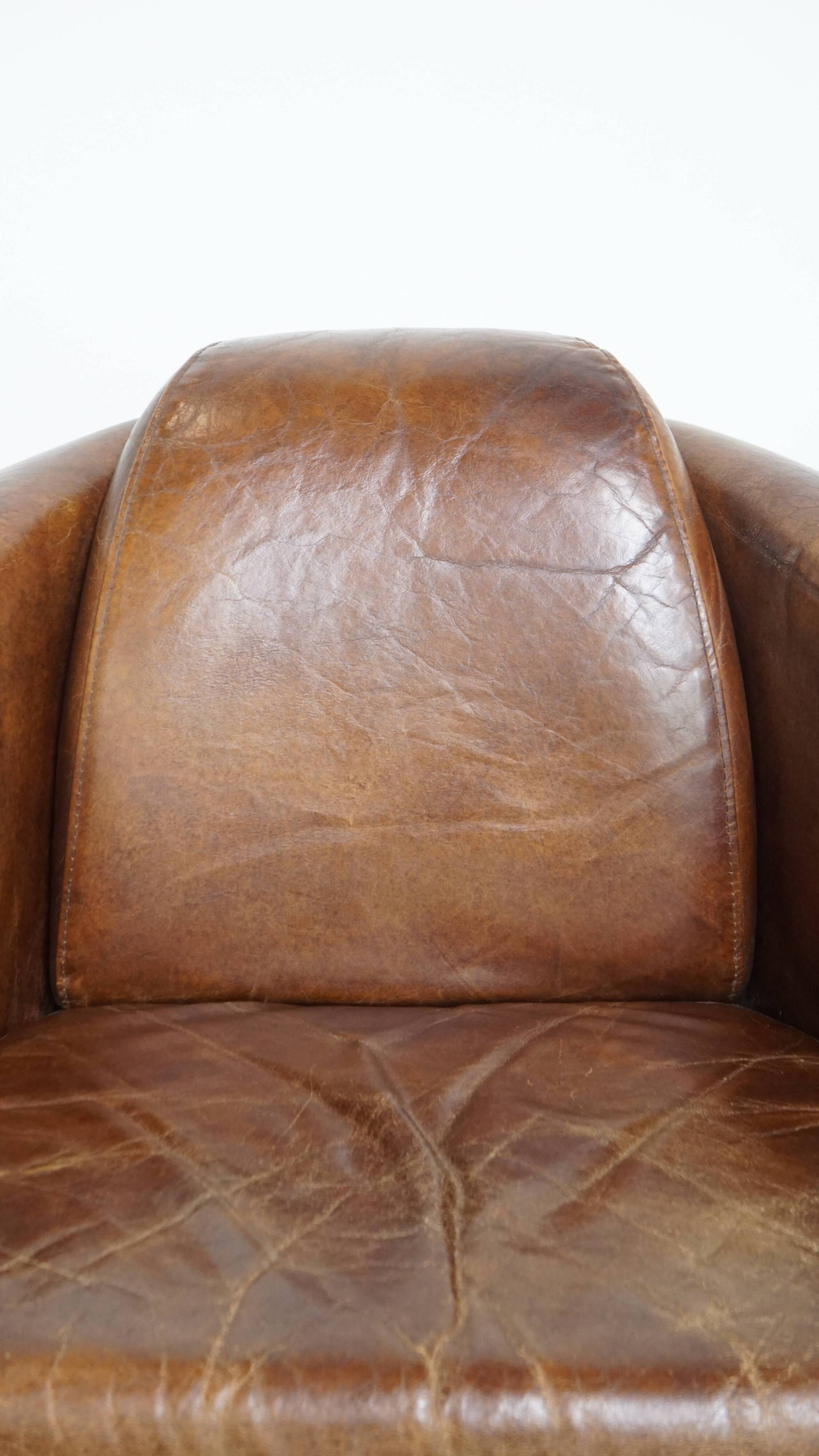 Brown Aviator design armchair made of cowhide leather