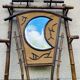 Bamboo coat rack from the 19th century, mirror in the shape of a crescent moon.