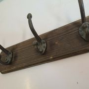 Wooden school coat rack with cast iron hooks