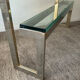 Console "G" by Belgochrom in brass and glass from the 1970s.