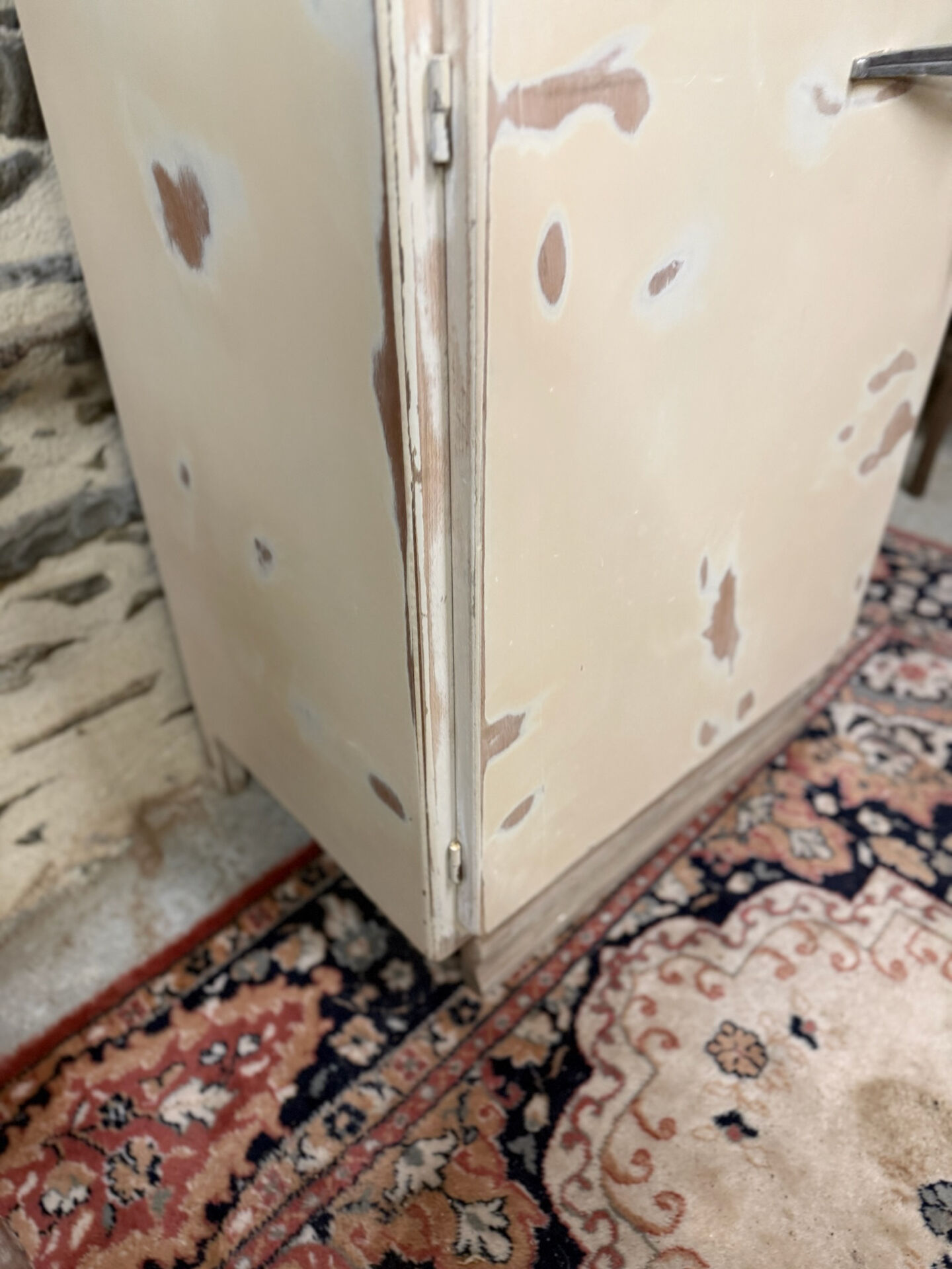 Small one-door Art Deco cabinet with a patina.