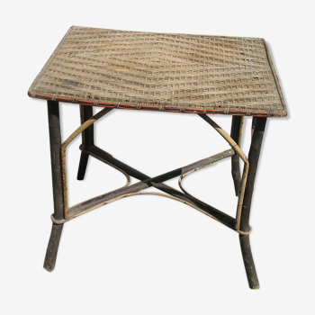 Small old table in rattan wicker