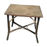 Small old table in rattan wicker