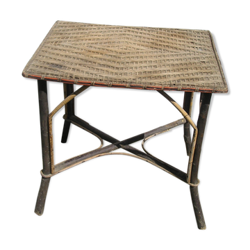 Small old table in rattan wicker
