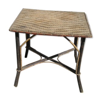 Small old table in rattan wicker