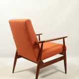 Scandinavian design curly orange armchair by H.Lis