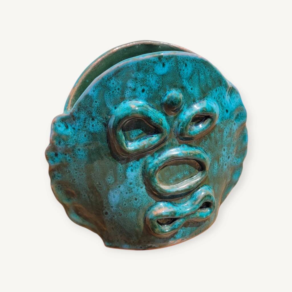 Turquoise glazed terracotta ceramic vase