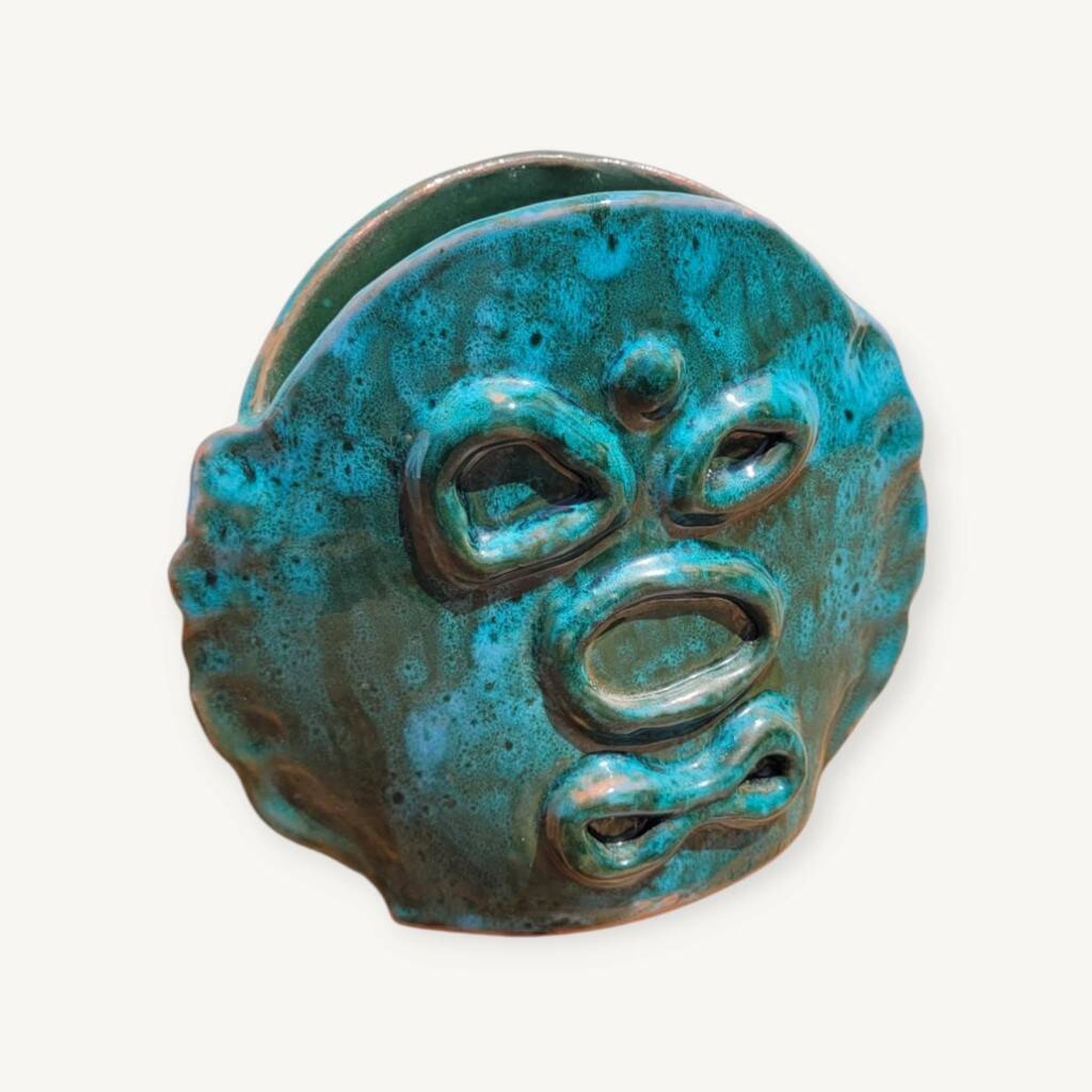 Turquoise glazed terracotta ceramic vase