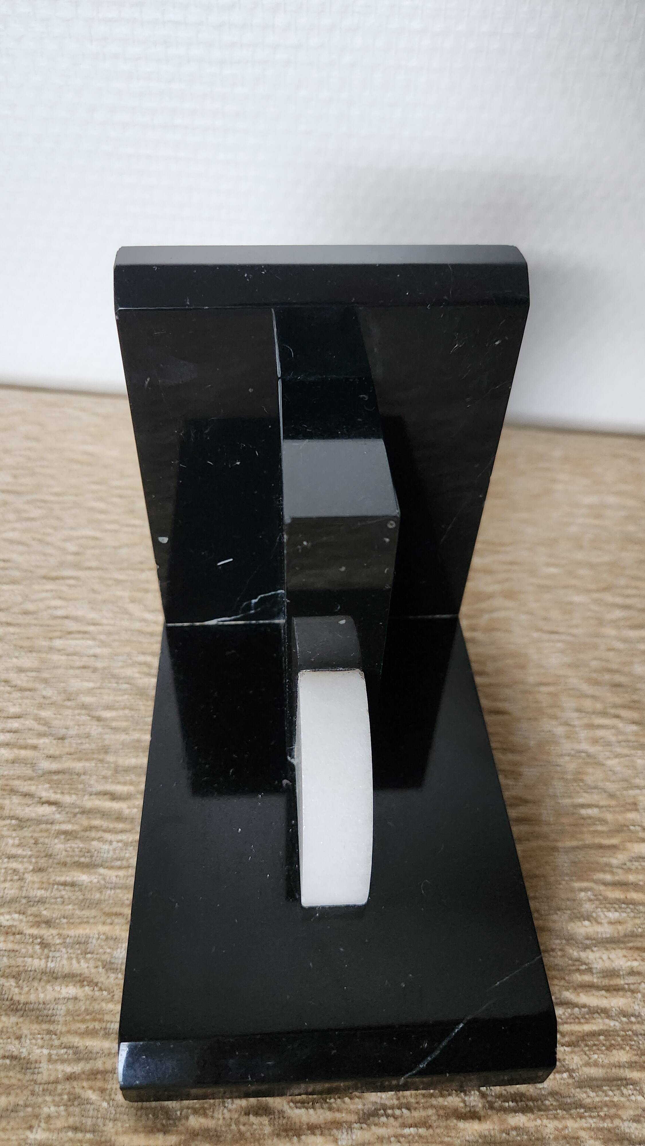 Geometric bookends in black marble and white stone – Art Deco style