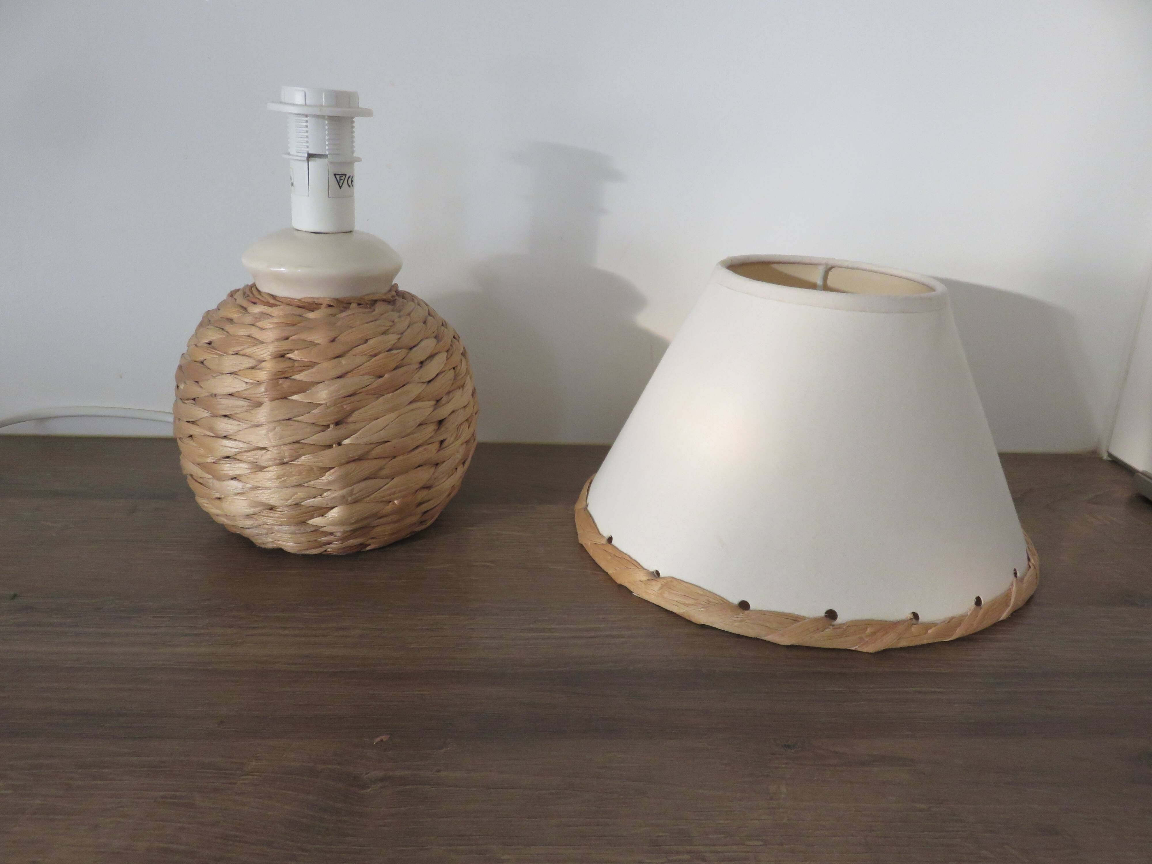 Pair of bedside lamps made of woven sea rush, matching lampshades, 1980.