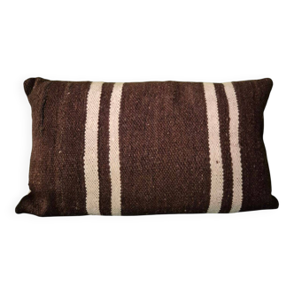 Cushion cover in old Berber blanket.
