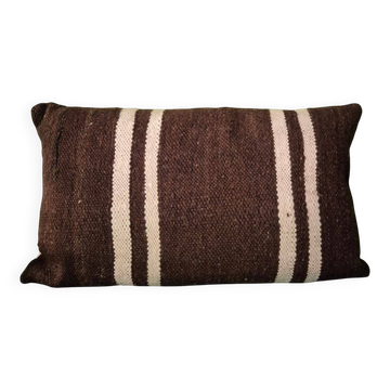 Cushion cover in old Berber blanket.