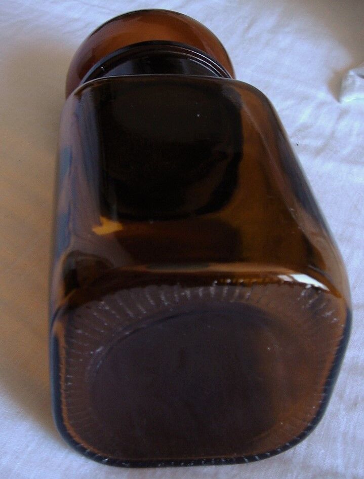 Vintage amber orange glass bottle