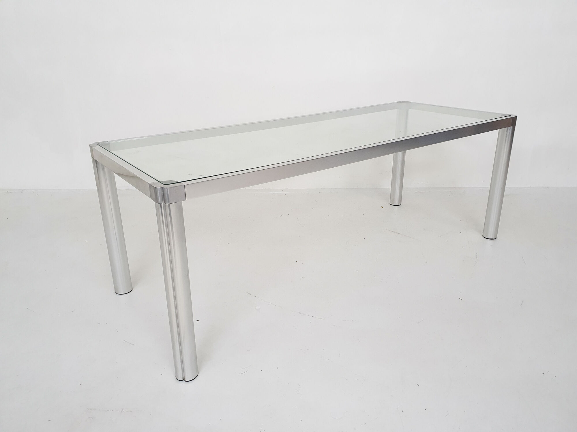 Glass and aluminum dining table by kho liang ie, the netherlands 1974