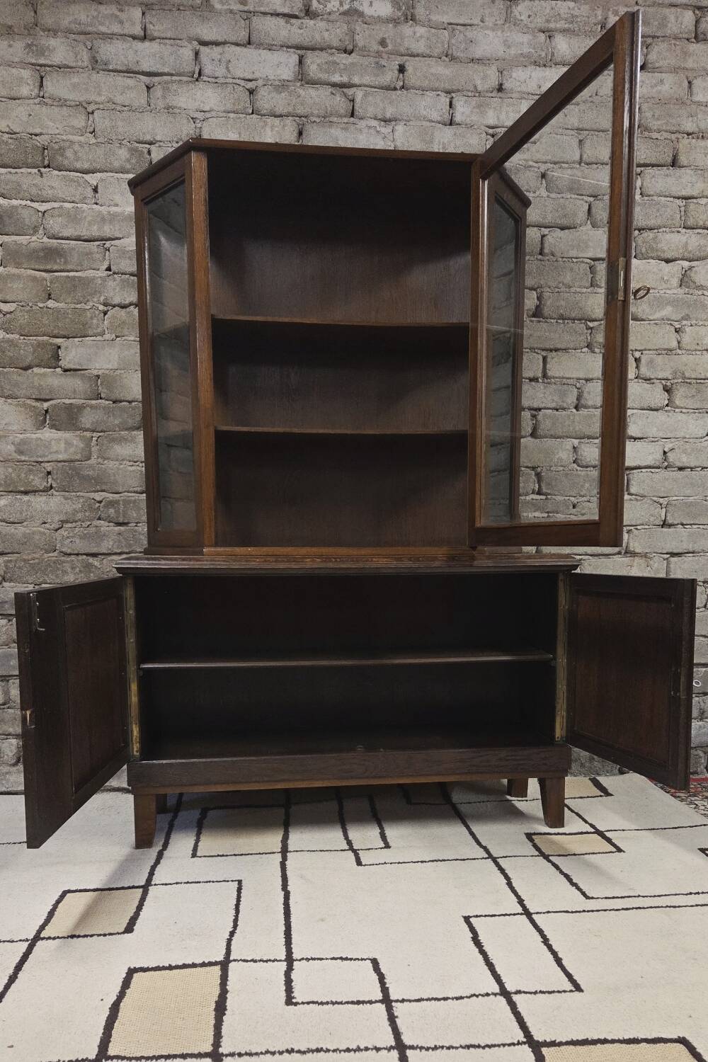 Vintage two-body display cabinet in oak from the 1950s.
