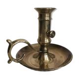 Old brass candlestick called "rat tail"