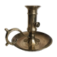 Old brass candlestick called "rat tail"