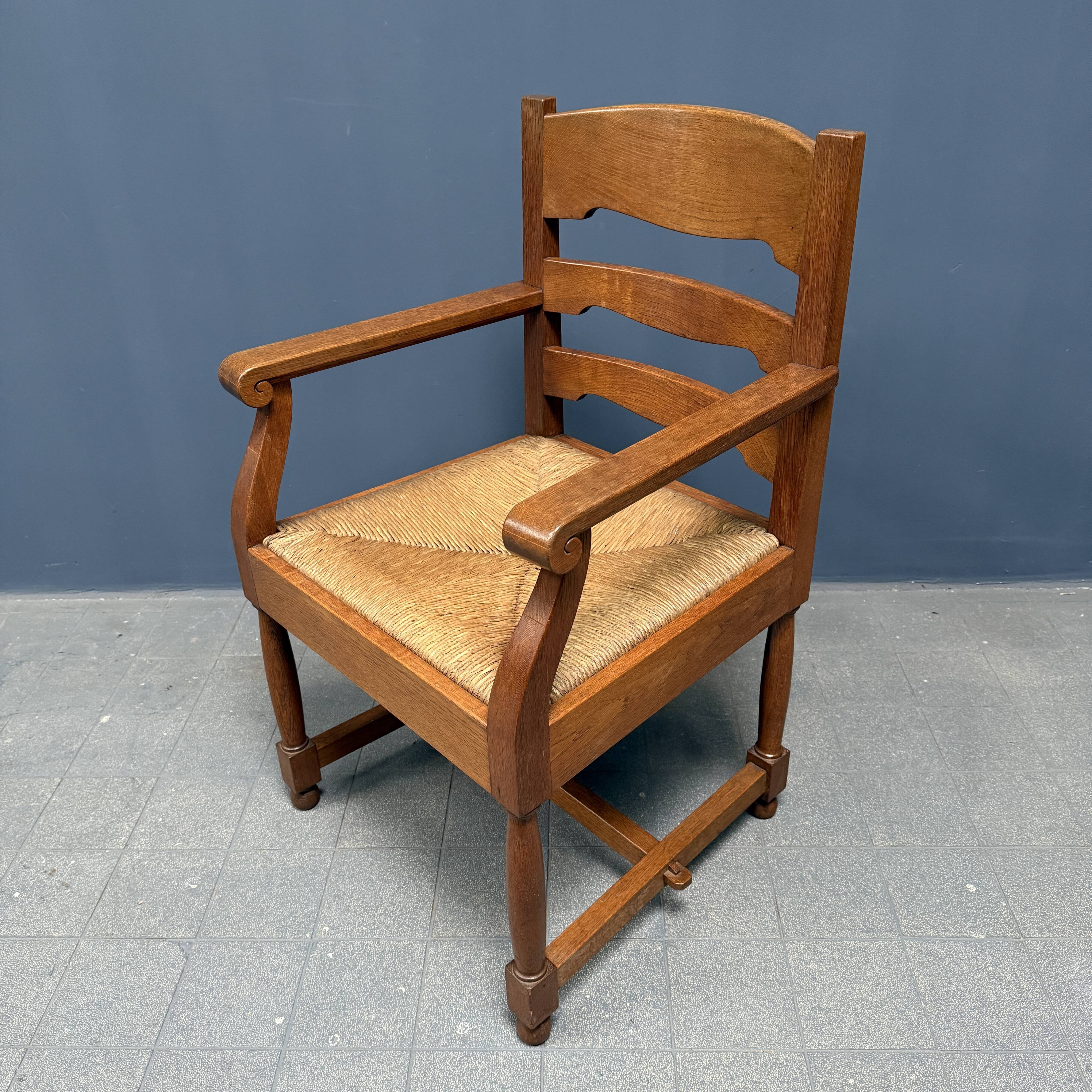 Set of two Dutch oak armchairs with rush seats