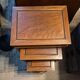 Stackable 3-piece nesting table in Asian teak wood with chinoiserie design.