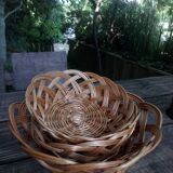 Set of three old rattan baskets