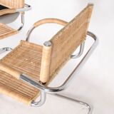 Pair of wicker and metal armchairs