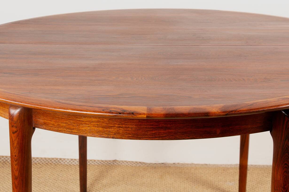 Danish extendable dining table in rosewood by Kai Lyngfeldt Larsen.