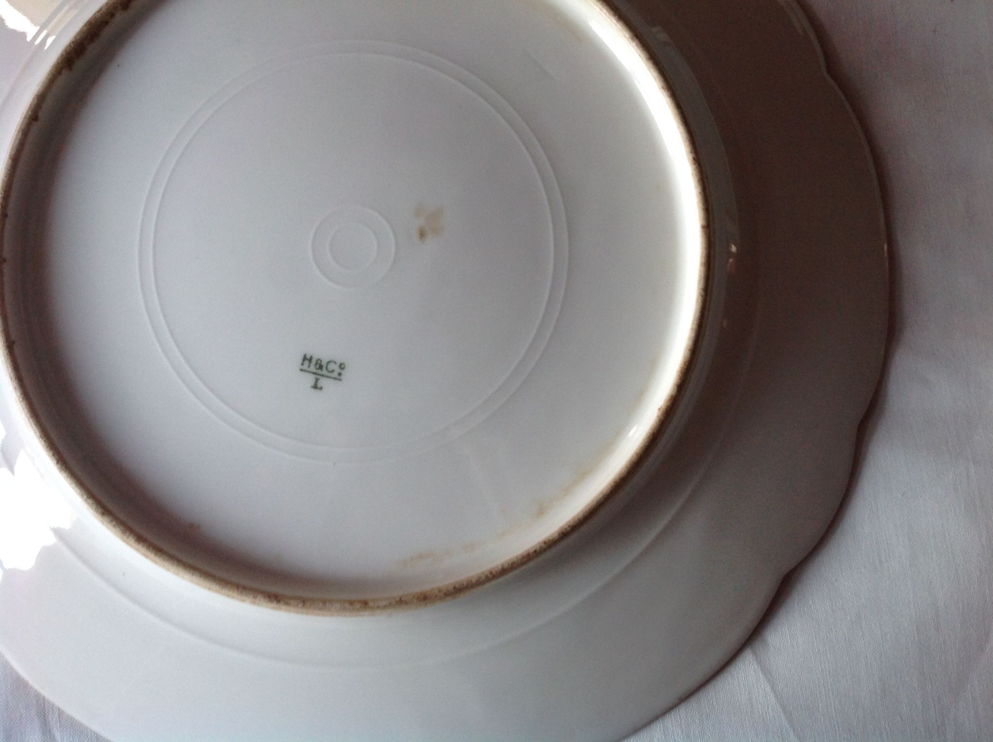 Flat porcelain plate of Limoges of the Haviland Manufacture (19th).