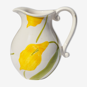 Pitcher with yellow flowers