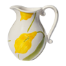 Pitcher with yellow flowers