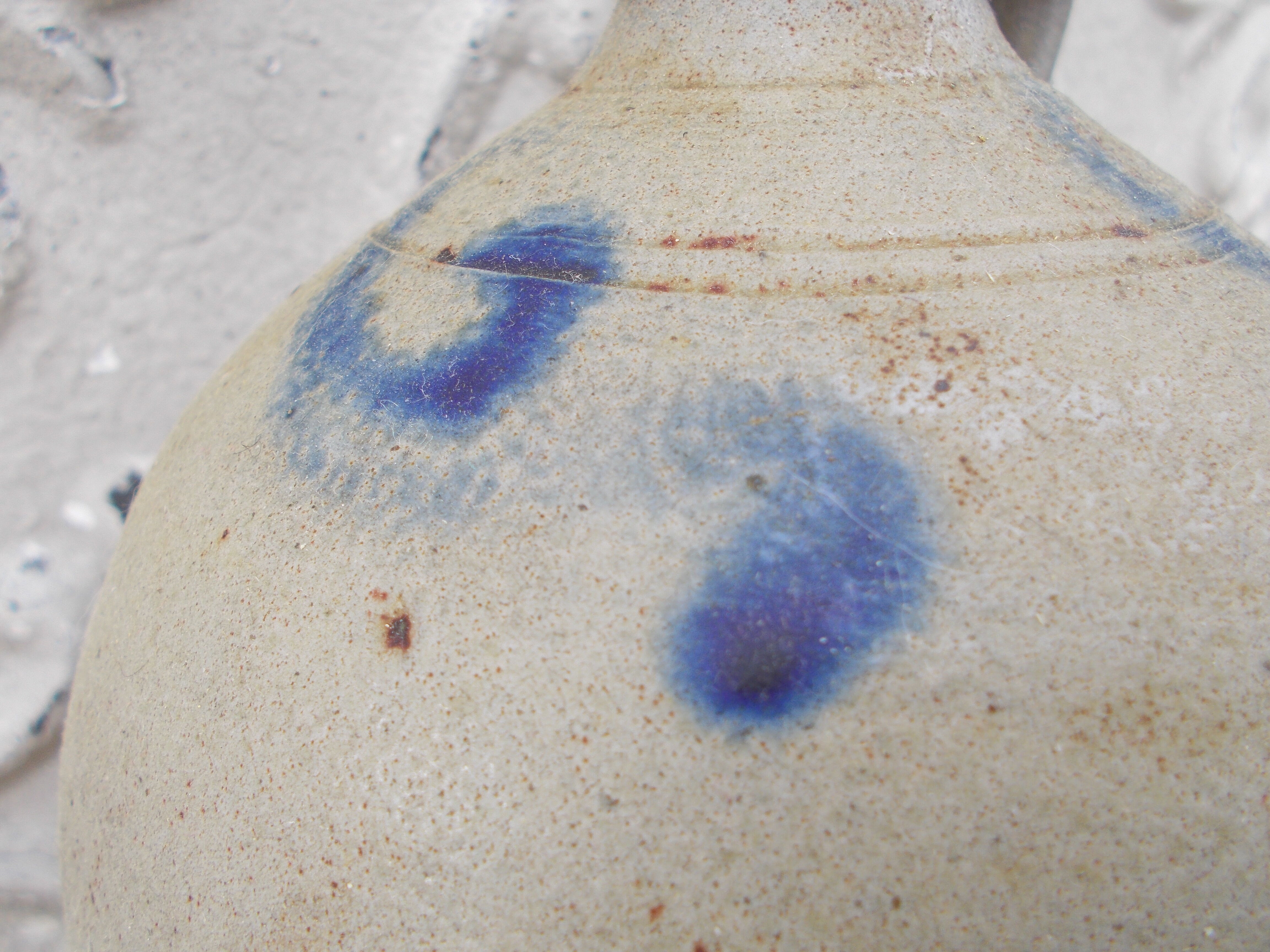 Old potiche jug in sandstone of Alsace