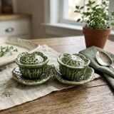 Salt and pepper shakers in the shape of a cabbage leaf.
